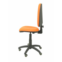 Silla Aýna similpiel naranja ruedas de parqué